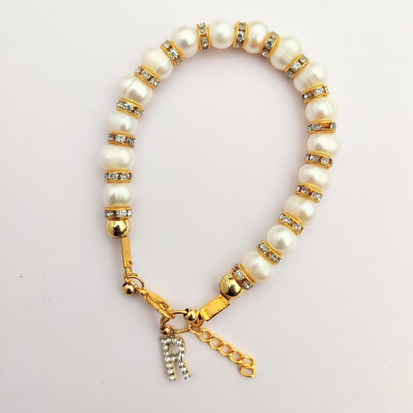 Luxurious Pearl Bracelet with Initial Charm