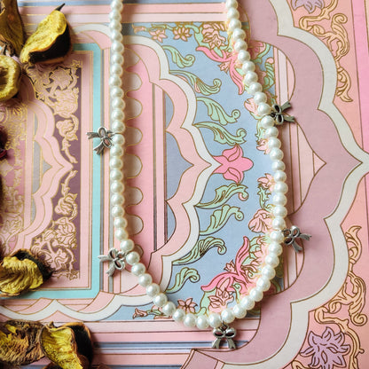 Pearl Necklace with Bow Charm