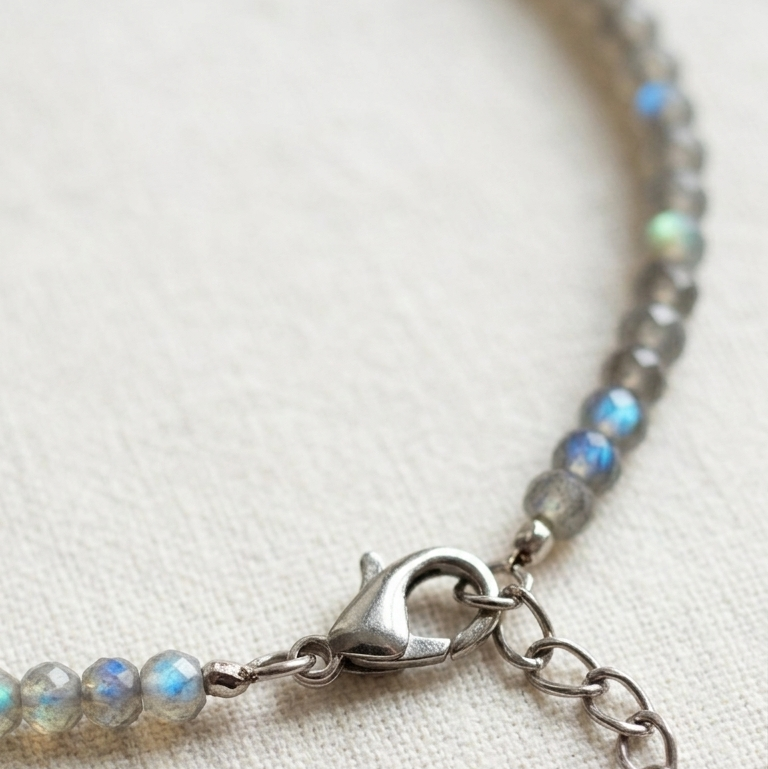 Close-up of a bracelet with beaded design on a light background