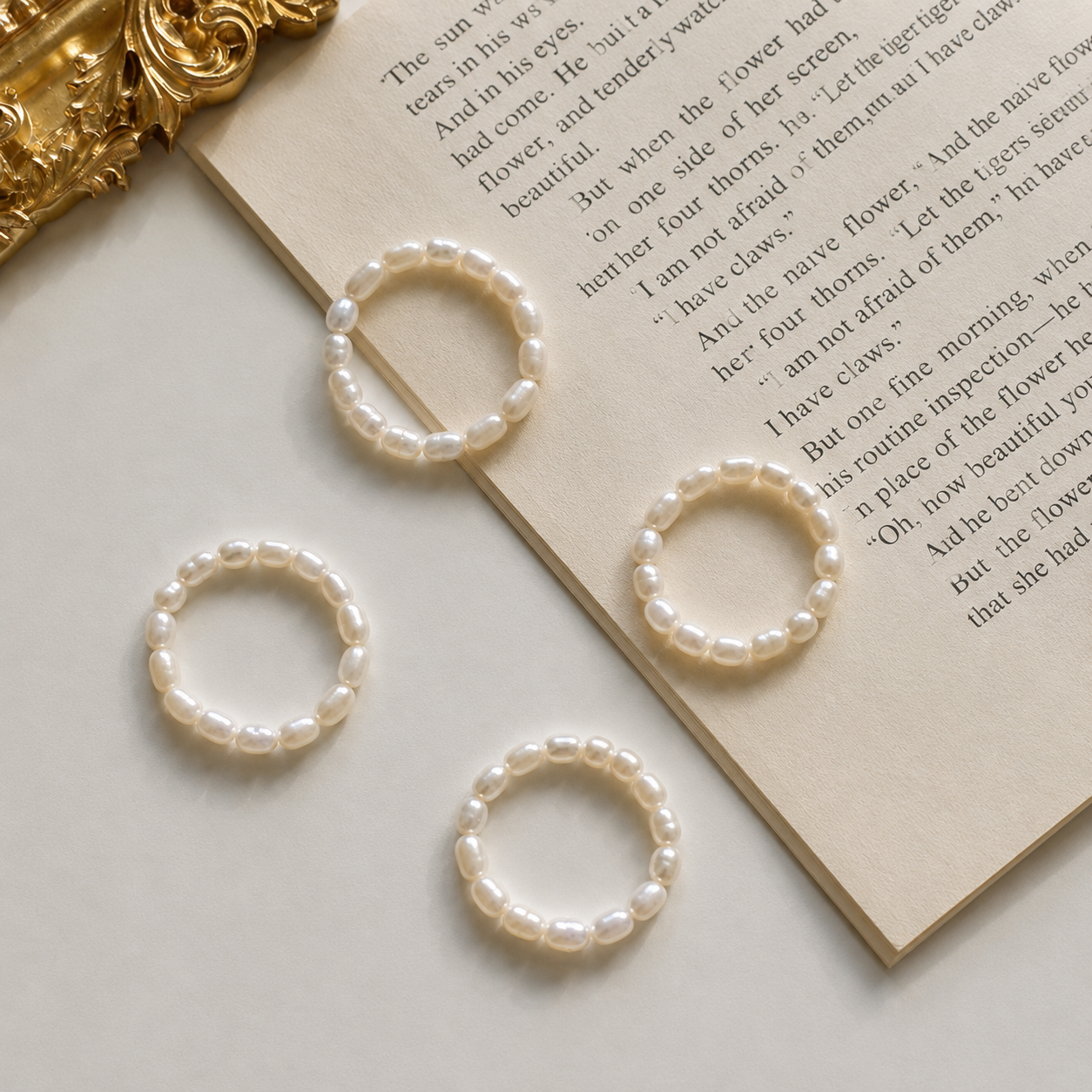 Pearl rings on a book page